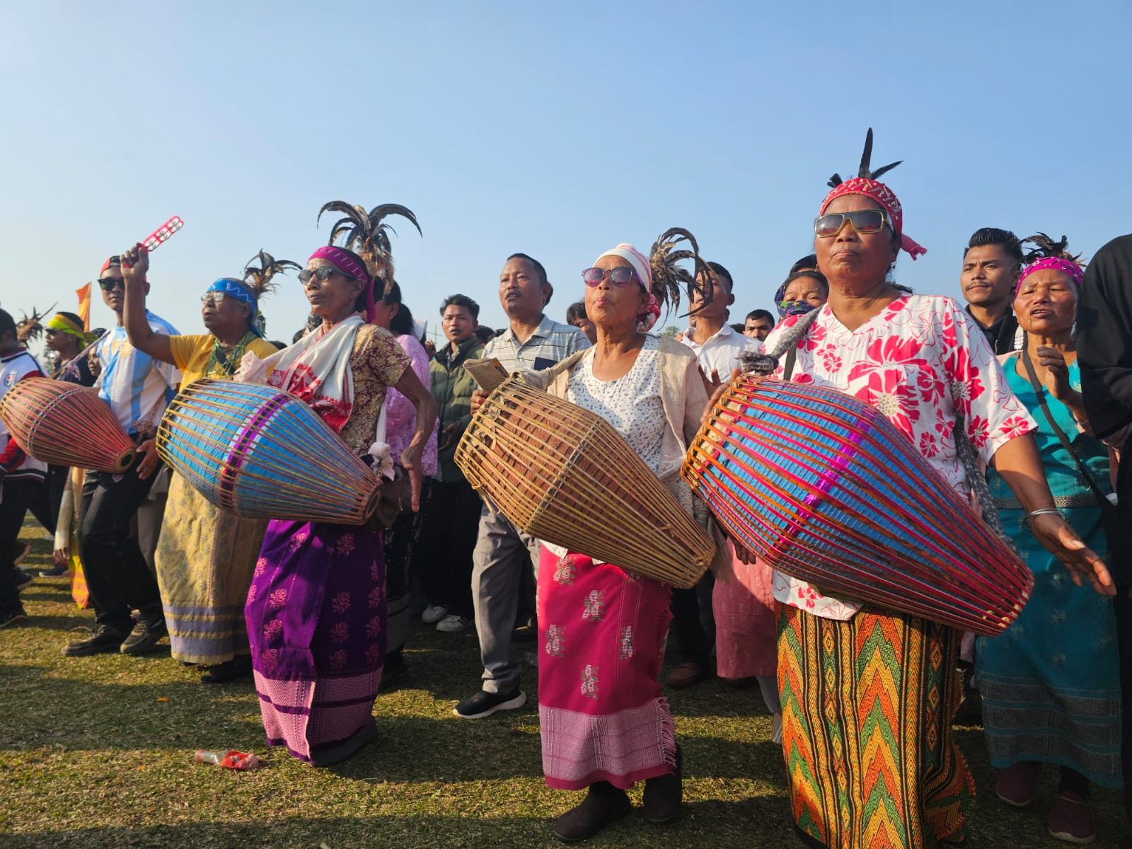 A massive celebration marked the Garo New Year 2026, bringing together thousands of people from across India and even international visitors to the Bangsi Apal playground in North Garo Hills. The festival showcased the rich cultural heritage of the Garo community and was especially notable for its vibrant drumming and traditional dances. The festivities began early in the morning around 9 AM, as the first beats of the drums echoed through the area, drawing crowds eager to join the celebration. Women, taking center stage, played powerful drum rhythms that energized the participants. Men, women, and young people danced together to the pulsating beats, creating a lively and colorful atmosphere. By noon, hundreds of thousands of people were seen dancing and celebrating in unison, marking one of the largest gatherings for the Garo New Year in recent years. The event not only highlighted the community’s artistic traditions but also reinforced unity, joy, and cultural pride among participants. Organizers said the festival aims to preserve tribal customs while providing a platform for cultural exchange, as many visitors from outside the region attended and participated. The 2026 celebration of the Garo New Year was hailed as a grand success, leaving lasting memories for all who attended.