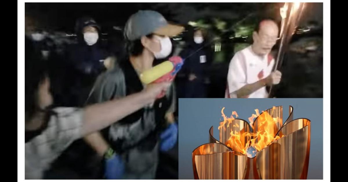 জাপানী ভাষাত 'No Olympics' আৰু 'Stop the games' বুলি কৈ শিখা নিৰ্বাপনৰ চেষ্টা