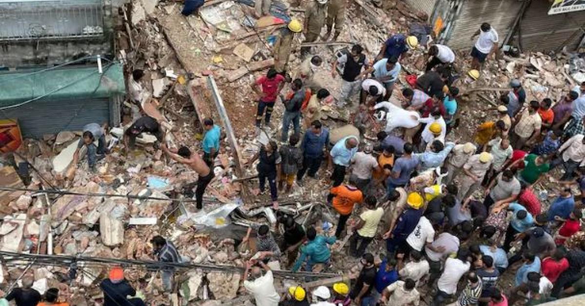 A three-storey building collapsed and buried several people, including children