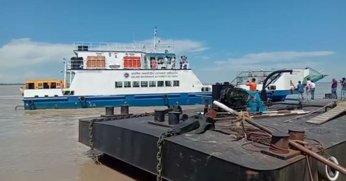 Passenger travelling to Majuli wearing life jacket for the first time