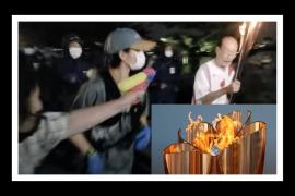 জাপানী ভাষাত 'No Olympics' আৰু 'Stop the games' বুলি কৈ শিখা নিৰ্বাপনৰ চেষ্টা