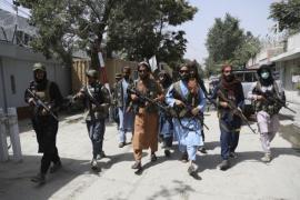 Taliban hands over hundreds of us dollars in weapons
