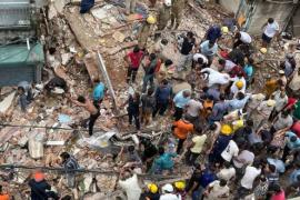 A three-storey building collapsed and buried several people, including children
